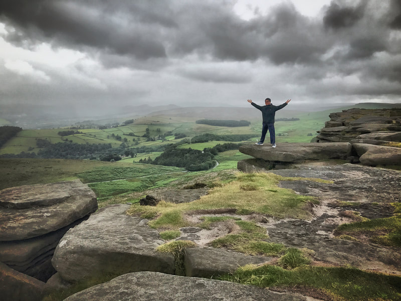 Enjoying the view from Stanage Edge in the Peak District
