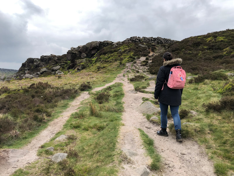 Hiking towards Carl Wark Iron Age fort in the Peak District