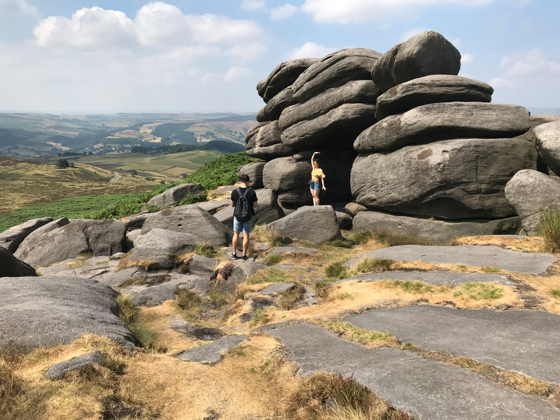 Enjoying the view from Higger Tor on a scenic tour of the Peak District