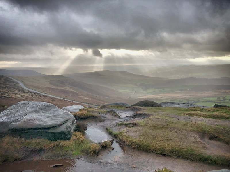 Crepuscular light over Stanage Edge in the Peak District