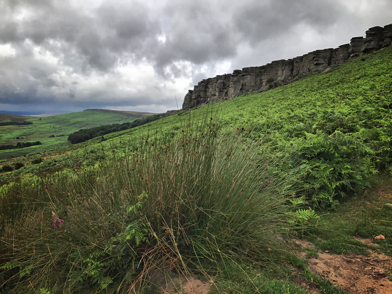 Dramtic sky over Stanage Edge in the Peak District