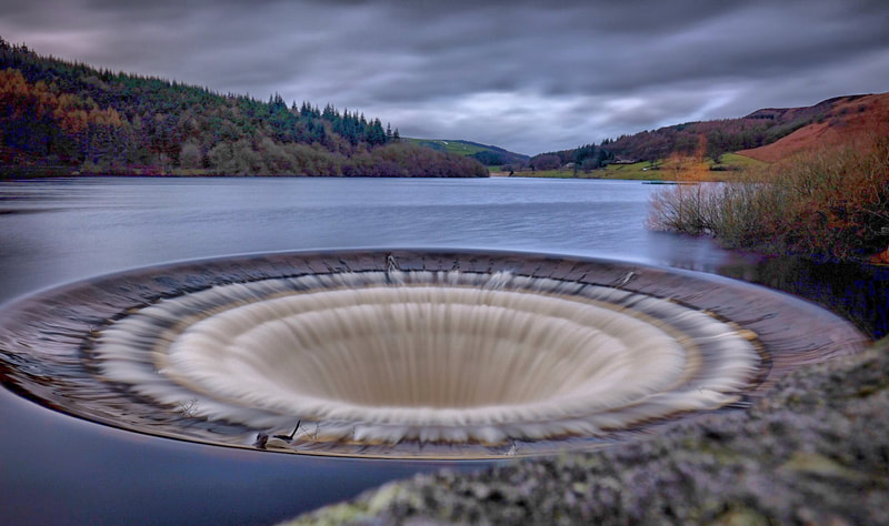 The plughole flowing at Ladybower reservoir