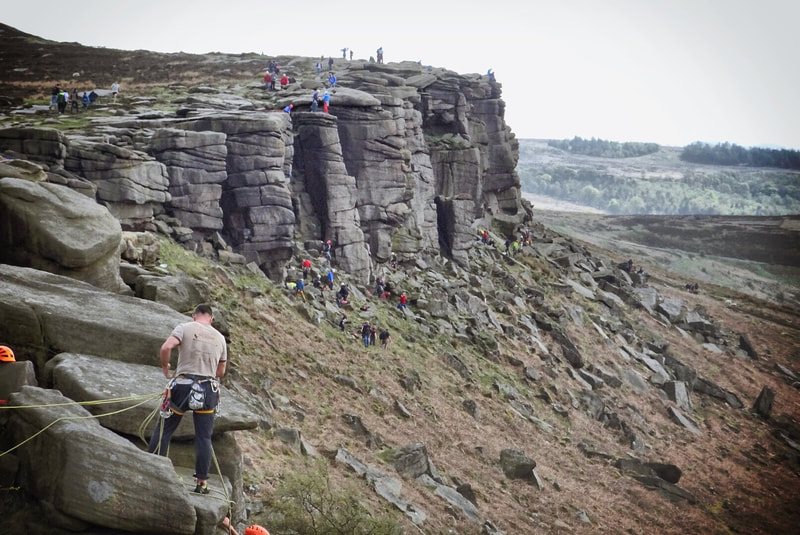 Rock climbing at Stanage Edge in the Peak District